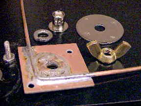 The indivual pieces of radial mounting hardware.